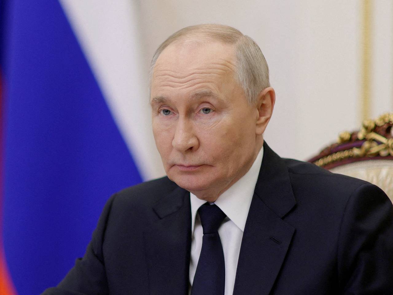 Путин внес трех россиян в спецсписок